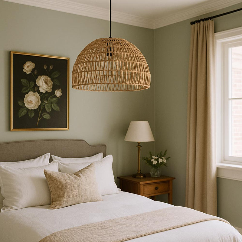 Cozy bedroom with a bed, lamp, and decorative elements.
