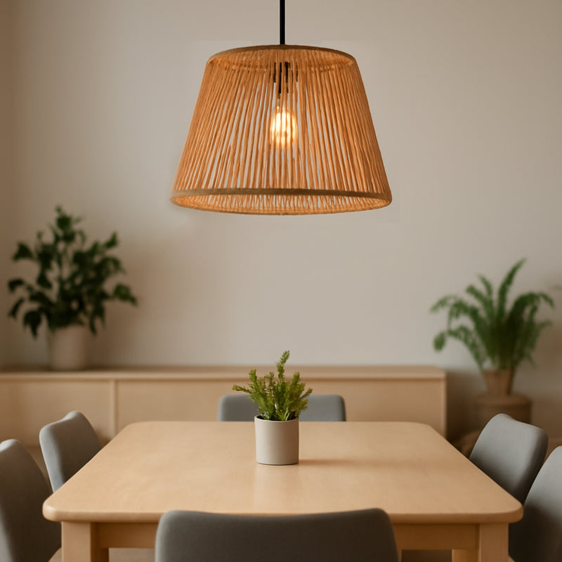 Dining room with wooden table, gray chairs, and a wicker pendant light.